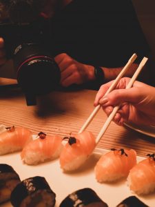australasia manchester salmon nigiri photographer chopsticks not just a tit
